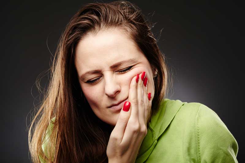 Woman in Tooth Pain
